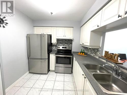 #2128 -68 Corporate Dr, Toronto, ON - Indoor Photo Showing Kitchen With Double Sink