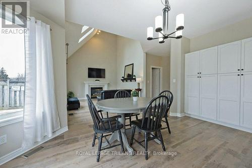 98 Meredith Dr N, Middlesex Centre, ON - Indoor Photo Showing Dining Room With Fireplace