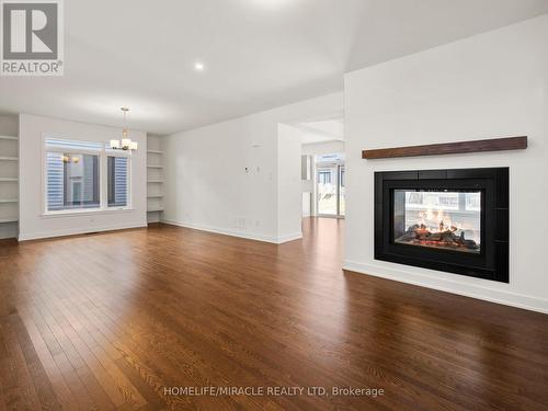 445 Turmeric Court, Ottawa, ON - Indoor Photo Showing Living Room With Fireplace