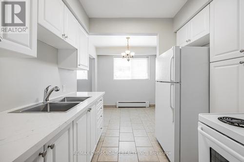 Apt # 2 - 304 Athol Street, Whitby, ON - Indoor Photo Showing Kitchen With Double Sink