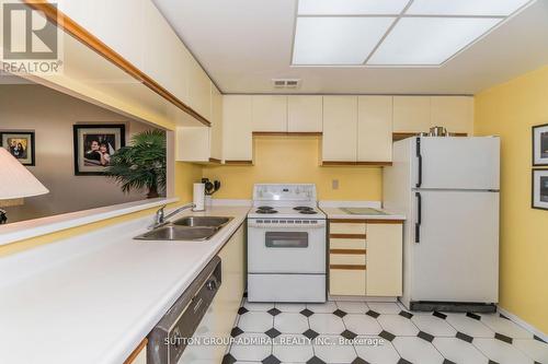 #702 -7601 Bathurst St, Vaughan, ON - Indoor Photo Showing Kitchen With Double Sink