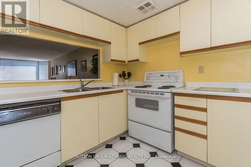 #702 -7601 Bathurst St, Vaughan, ON - Indoor Photo Showing Kitchen With Double Sink