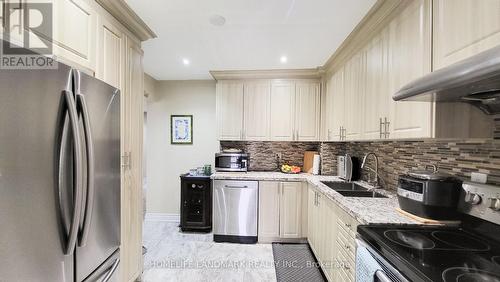 130 Kingswood Drive, Brampton, ON - Indoor Photo Showing Kitchen With Double Sink