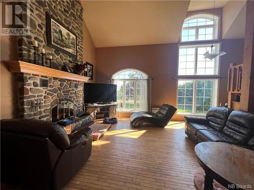 245 Rue Marcoux, Balmoral, NB - Indoor Photo Showing Living Room With Fireplace