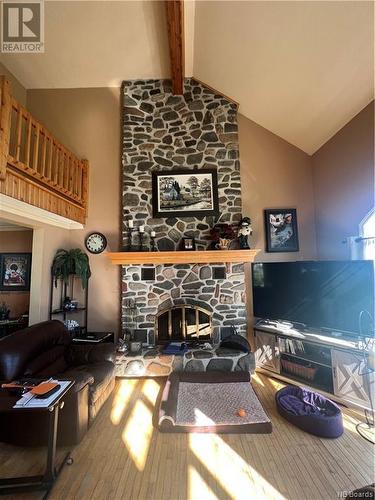 245 Rue Marcoux, Balmoral, NB - Indoor Photo Showing Living Room With Fireplace