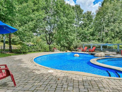 Pool - 7-102 Ch. Des Quatre-Sommets, Mont-Tremblant, QC - Outdoor With In Ground Pool With Backyard