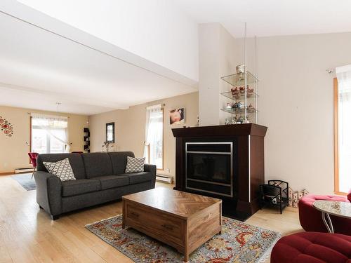 Salon - 3405 Rue Pierre-Thomas-Hurteau, Longueuil (Saint-Hubert), QC - Indoor Photo Showing Living Room With Fireplace