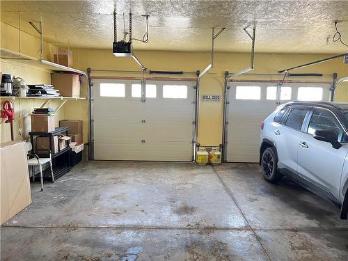 81 Mockingbird Drive, Brandon, MB - Indoor Photo Showing Garage