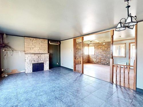 Living room - 4500 Ch. Gauthier, Terrebonne (La Plaine), QC - Indoor Photo Showing Other Room With Fireplace