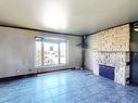 Living room - 4500 Ch. Gauthier, Terrebonne (La Plaine), QC  - Indoor With Fireplace 
