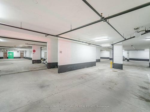 408-55 Yorkland Blvd, Brampton, ON - Indoor Photo Showing Garage