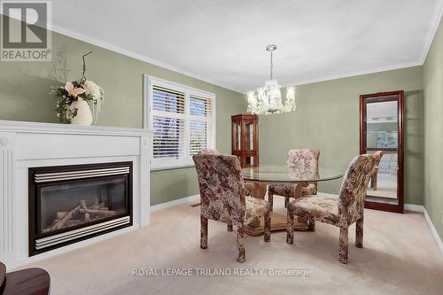 #36 -1443 Commissioners Rd W, London, ON - Indoor Photo Showing Other Room With Fireplace