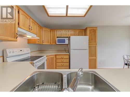 10505 Quinpool Road Unit# 12, Summerland, BC - Indoor Photo Showing Kitchen With Double Sink