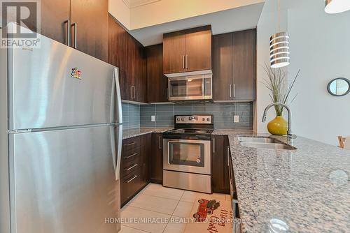 1609 - 840 Queens Plate Drive, Toronto, ON - Indoor Photo Showing Kitchen With Double Sink With Upgraded Kitchen