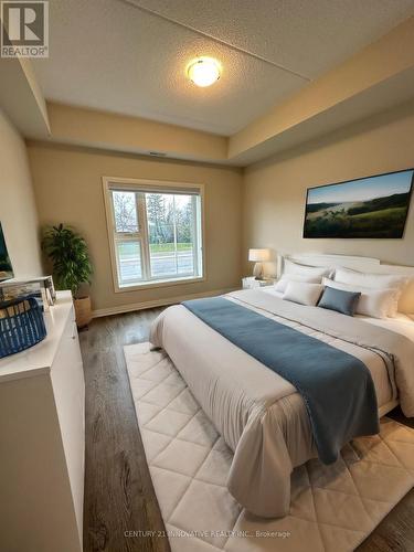 213 - 610 Farmstead Drive, Milton, ON - Indoor Photo Showing Bedroom
