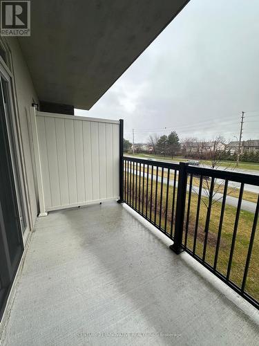 213 - 610 Farmstead Drive, Milton, ON - Outdoor With Balcony With Exterior