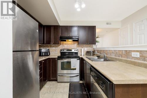 #104 -1483 Maple Ave, Milton, ON - Indoor Photo Showing Kitchen With Stainless Steel Kitchen With Double Sink