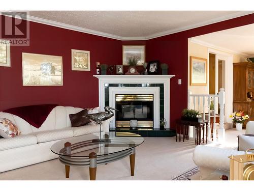13725 Waldina Road, Prince George, BC - Indoor Photo Showing Living Room With Fireplace