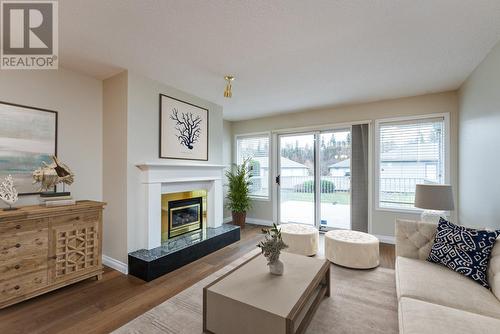122 801 Preston Road, Prince George, BC - Indoor Photo Showing Living Room With Fireplace