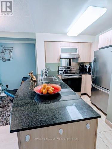 #606 -105 Victoria St, Toronto, ON - Indoor Photo Showing Kitchen With Double Sink