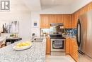#104 -207 Wellesley St E, Toronto, ON  - Indoor Photo Showing Kitchen With Double Sink 