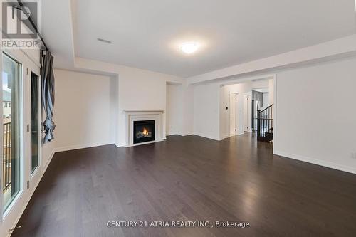 12 Hilts Drive, Richmond Hill, ON - Indoor Photo Showing Other Room With Fireplace