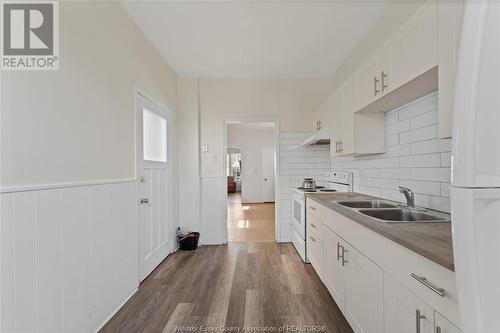 1027-1033 Howard, Windsor, ON - Indoor Photo Showing Kitchen With Double Sink