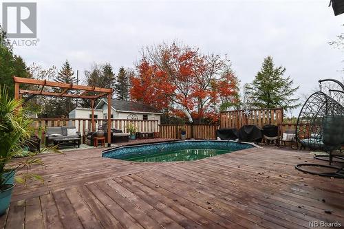 497 Hampton Road, Quispamsis, NB - Outdoor With Above Ground Pool With Deck Patio Veranda