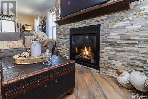 497 Hampton Road, Quispamsis, NB - Indoor Photo Showing Living Room With Fireplace