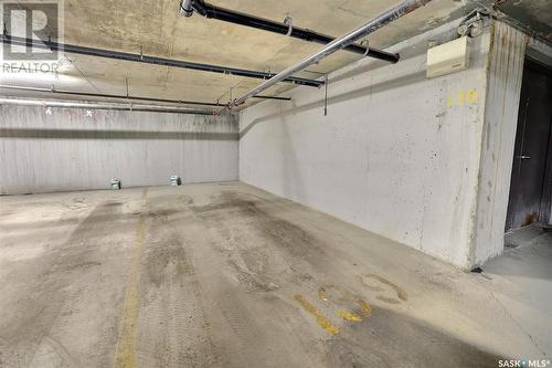 102 5301 Universal Crescent, Regina, SK - Indoor Photo Showing Garage