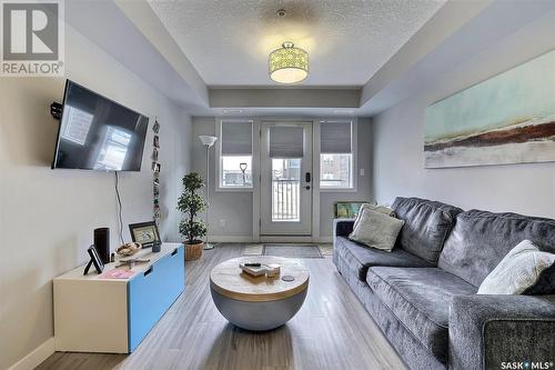 102 5301 Universal Crescent, Regina, SK - Indoor Photo Showing Living Room