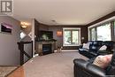 2077 Broder Street, Regina, SK  - Indoor Photo Showing Living Room With Fireplace 