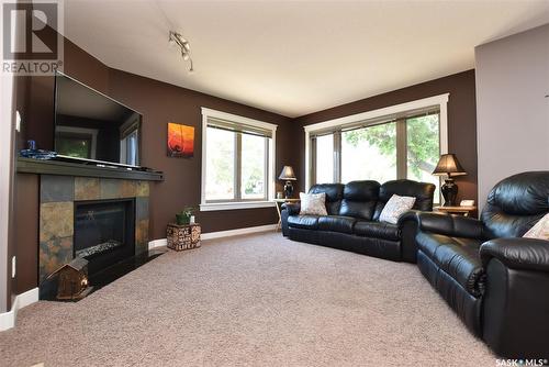 2077 Broder Street, Regina, SK - Indoor Photo Showing Living Room With Fireplace