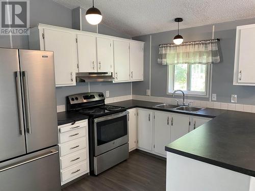 6446 Lynx Road, 100 Mile House, BC - Indoor Photo Showing Kitchen With Double Sink