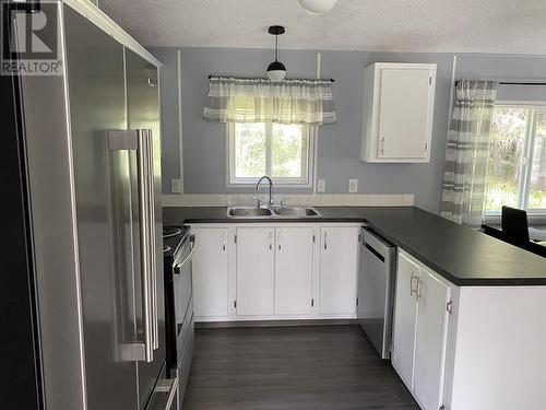 6446 Lynx Road, 100 Mile House, BC - Indoor Photo Showing Kitchen With Double Sink