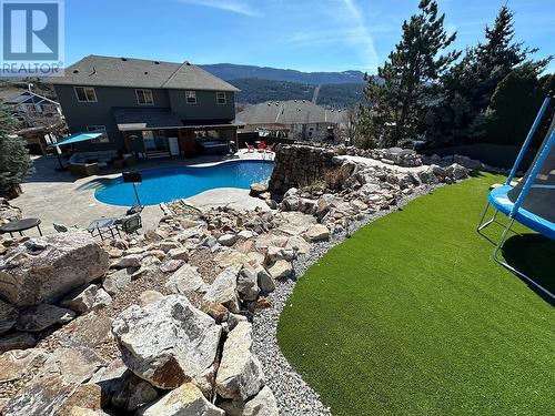 573 Mt Symons Place, Coldstream, BC - Outdoor With In Ground Pool With Backyard