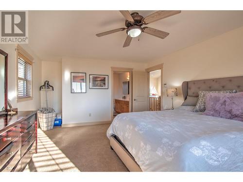 573 Mt Symons Place, Coldstream, BC - Indoor Photo Showing Bedroom