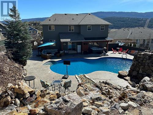 573 Mt Symons Place, Coldstream, BC - Outdoor With In Ground Pool