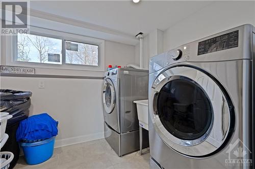 Laundry room on lower level - 824 Russett Drive, Arnprior, ON - Indoor Photo Showing Laundry Room