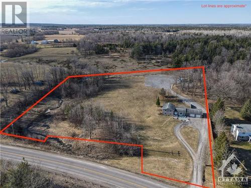 The house is well positioned, back from the road. No rear neighbours. Lot lines are approximate. - 824 Russett Drive, Arnprior, ON - Outdoor With View
