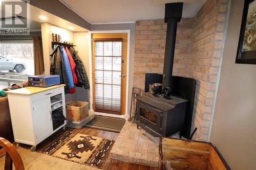 24 Oakley Lane, Tweed, ON - Indoor With Fireplace