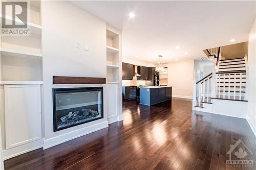 600 Mikinak Road, Ottawa, ON - Indoor Photo Showing Living Room With Fireplace