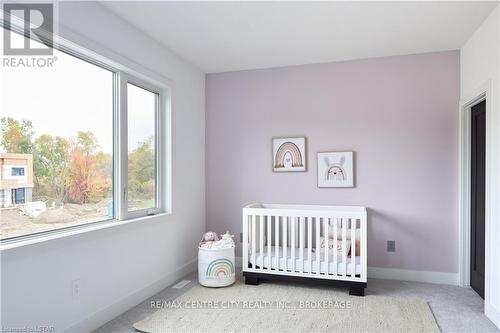 209 Merritt Crt, North Middlesex, ON - Indoor Photo Showing Bedroom