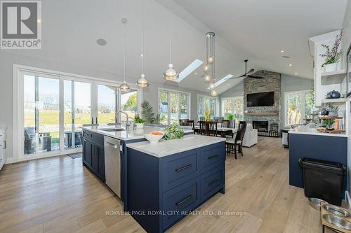 1209 Village Rd, North Dumfries, ON - Indoor Photo Showing Kitchen With Fireplace With Upgraded Kitchen