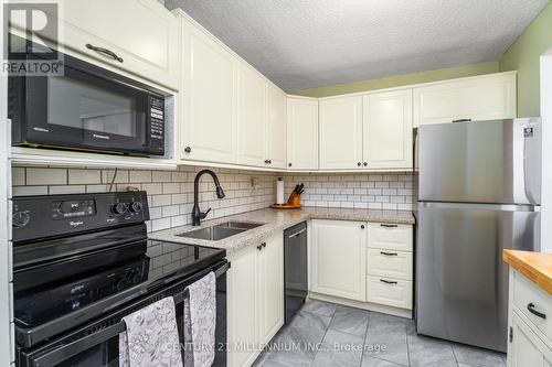 #907 -1100 Caven St, Mississauga, ON - Indoor Photo Showing Kitchen With Stainless Steel Kitchen With Double Sink