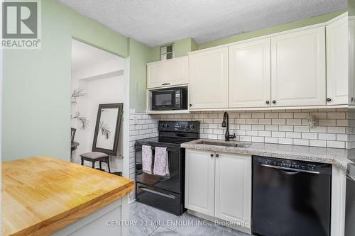 907 - 1100 Caven Street, Mississauga, ON - Indoor Photo Showing Kitchen