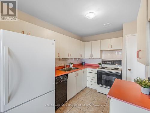 #504 -785 Browns Line, Toronto, ON - Indoor Photo Showing Kitchen With Double Sink