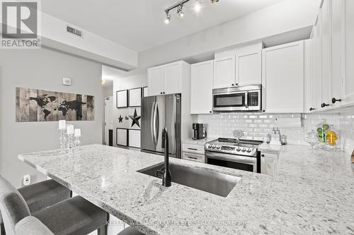 412 - 1370 Costigan Road, Milton, ON - Indoor Photo Showing Kitchen With Stainless Steel Kitchen With Upgraded Kitchen