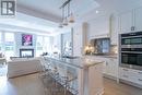 304 - 133 Hazelton Avenue, Toronto, ON  - Indoor Photo Showing Kitchen With Fireplace With Upgraded Kitchen 