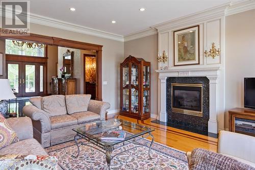 944 Lake Trail Drive, Windsor, ON - Indoor Photo Showing Living Room With Fireplace